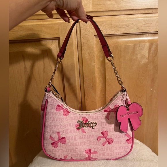 Juicy Couture Handbags - Juicy Couture Pink Bow Charm Shoulder Bag
